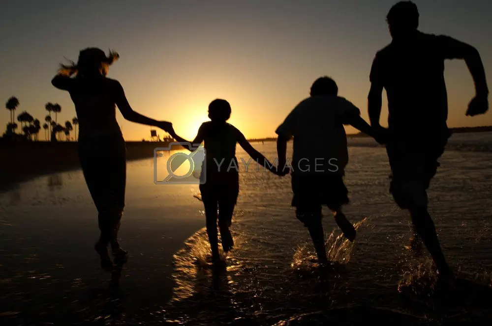 Free Stock Images to use for Website Hero Images:  Happy Family in Sunset